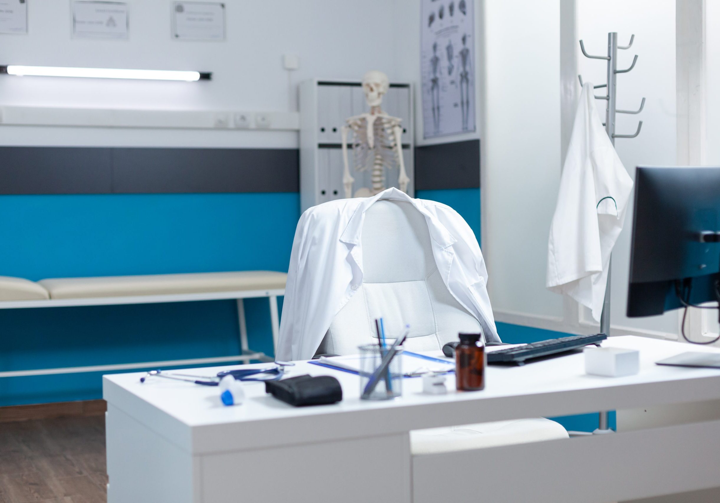 Empty modern medical office having disease documents on table equipped with contemporary furniture. Hospital workplace with nobody in it ready for sickness consultation. Medicine support